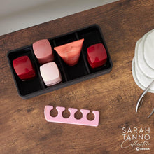 Load image into Gallery viewer, iDesign The Sarah Tanno 4 Slot Silicone Cosmetic Drawer Organizer Black
